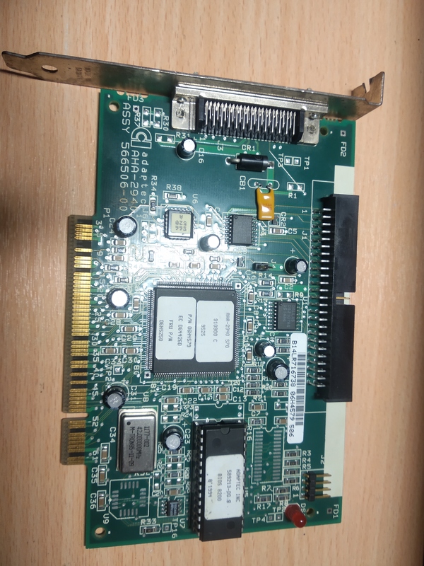 Контроллер SCSI к ним